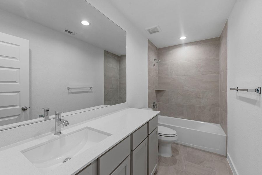 Furnished interior view inside a new home in Grand Mason Crossing, Katy (Image 10).