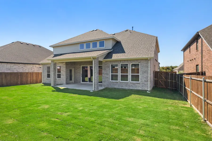 Exterior details and patio area of a home in Lake Breeze, Lavon (Image 3). Exterior details and patio area of a home in Lake Breeze, Lavon (Image 3).