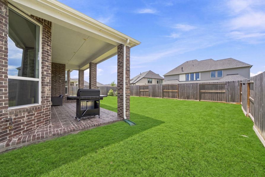 Exterior details and patio area of a home in , Fulshear (Image 25). Exterior details and patio area of a home in , Fulshear (Image 25).