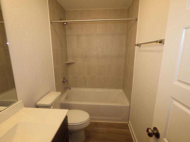 Furnished interior view inside a new home in Pinewood at Grand Texas, New Caney (Image 3).