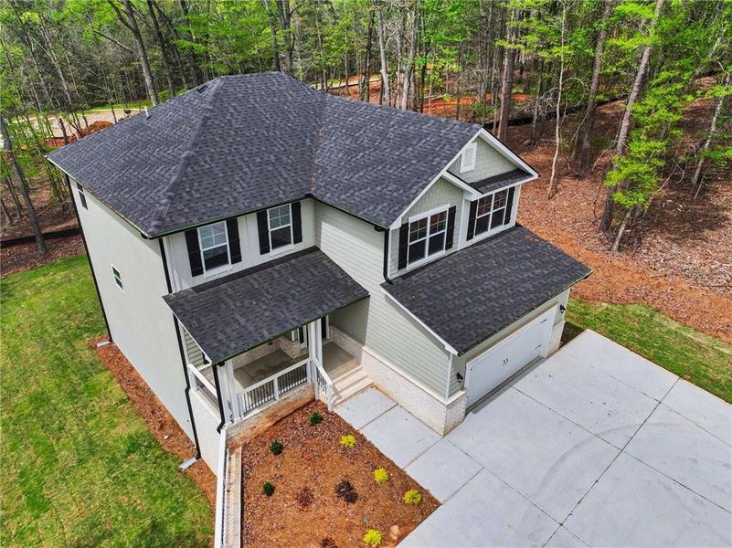 Exterior details and patio area of a home in The Fields of Walnut Creek, Pendergrass (Image 22).