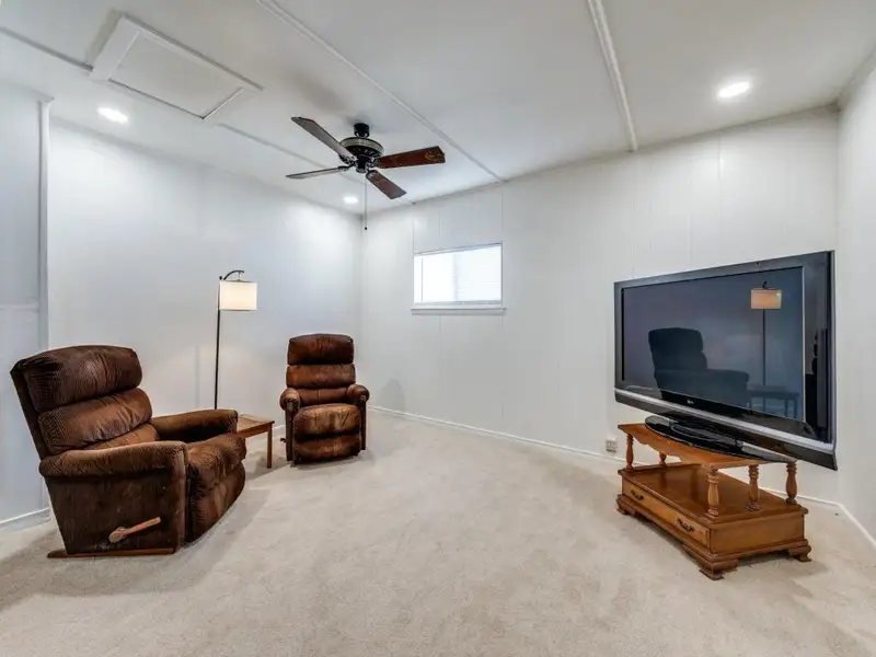 Sitting room with carpet floors, ceiling fan, attic access, and recessed lighting Sitting room with carpet floors, ceiling fan, attic access, and recessed lighting