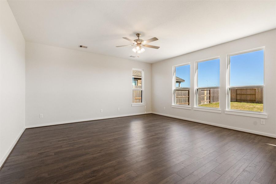 Spacious, unfurnished interior of a new home in Sunterra, Katy (Image 33).