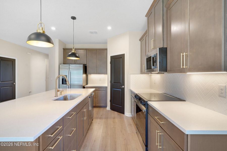 Furnished interior view inside a new home in Seminole Palms Single-Family Homes, Palm Coast (Image 14).