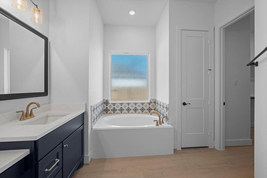 Furnished interior view inside a new home in Artavia, Conroe (Image 12).