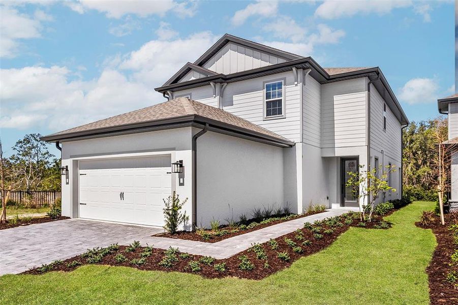 Front exterior of a new home in , Kissimmee, FL, highlighting curb appeal (Image 1). Front exterior of a new home in , Kissimmee, FL, highlighting curb appeal (Image 1).