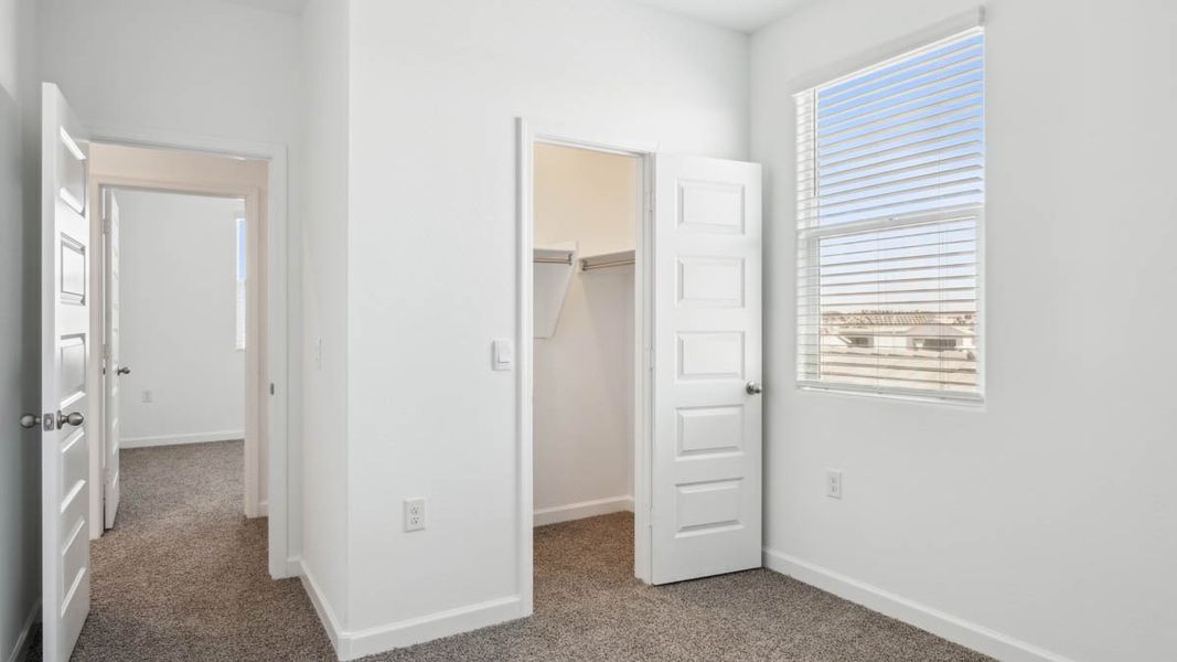 Representative unfurnished interior of a home built from the Mitchell by D.R. Horton in Upper Canyon, Phoenix (Image 31).