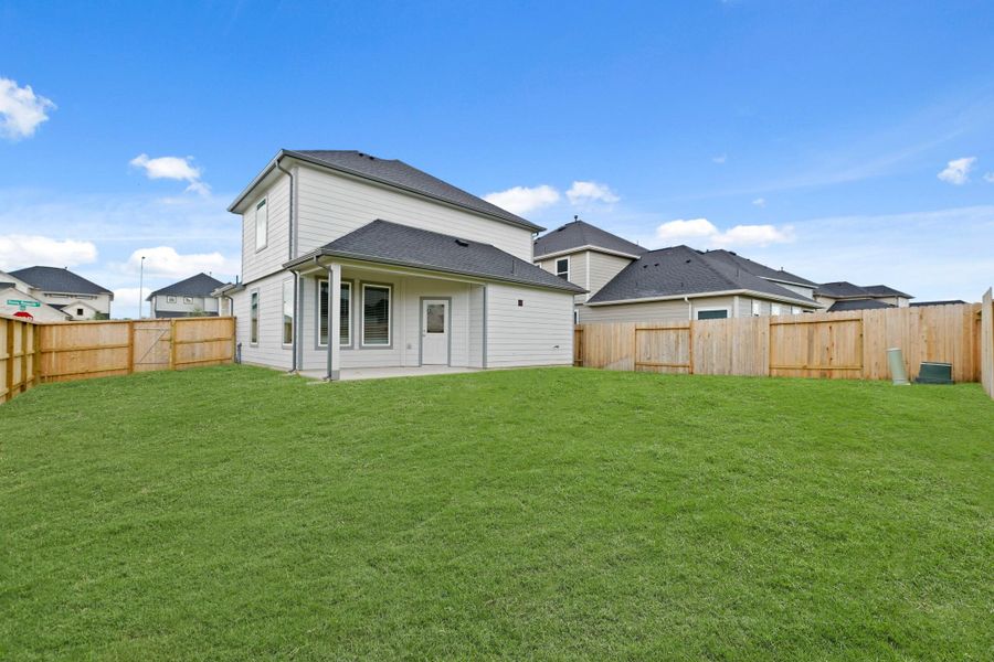 Exterior details and patio area of a home in Grand Oaks Village, Houston (Image 17). Exterior details and patio area of a home in Grand Oaks Village, Houston (Image 17).
