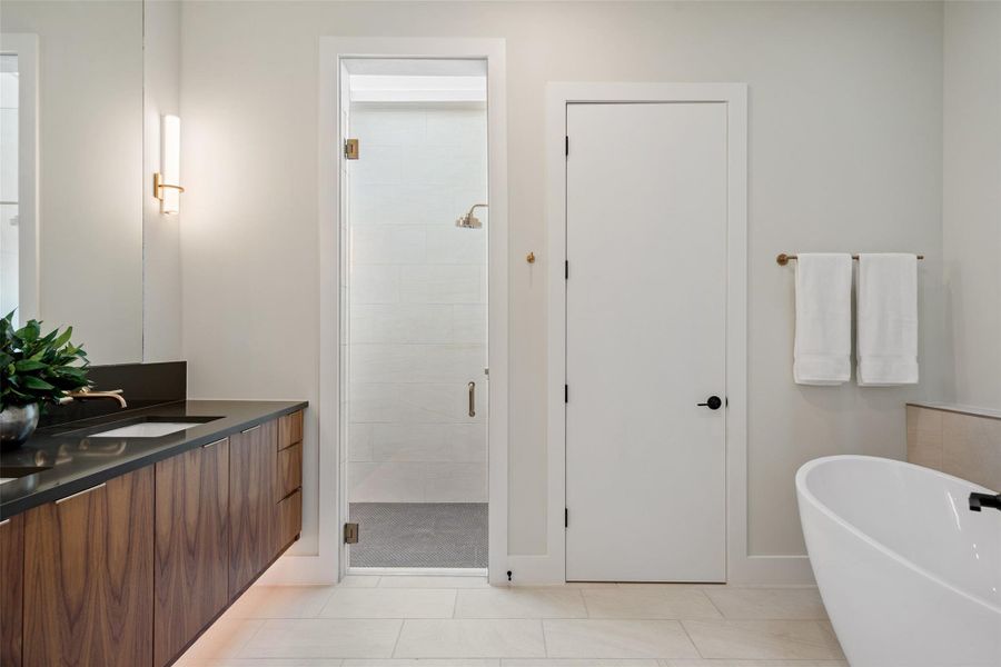 Primary Bath with garden tub and curbless shower.