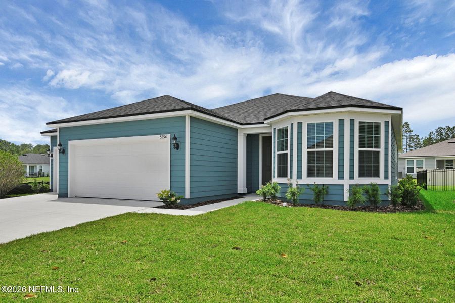 Front exterior of a new home in Hyland Trail, Green Cove Springs, FL, highlighting curb appeal (Image 26).