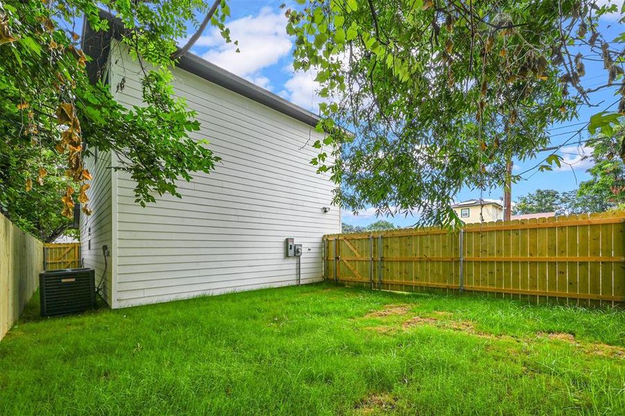 View of yard with central AC