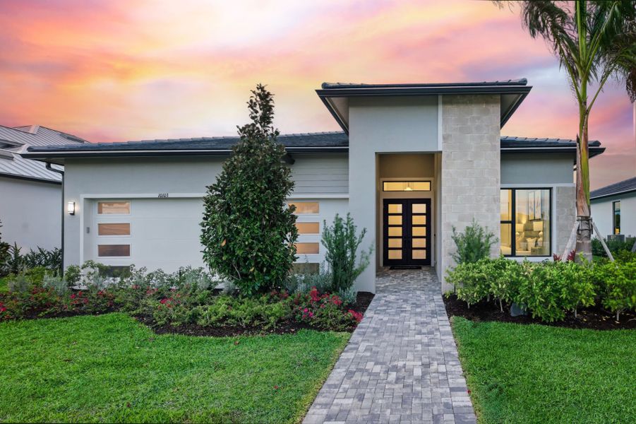 Representative exterior photo of a completed home built from the Layton by DiVosta in Amara, Lake Worth, FL (Image 16). Representative exterior photo of a completed home built from the Layton by DiVosta in Amara, Lake Worth, FL (Image 16).