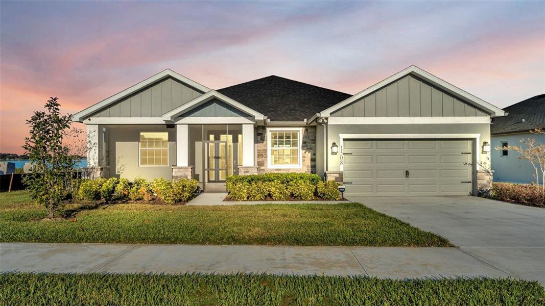 Front exterior of a new home in , Lake Alfred, FL, highlighting curb appeal (Image 2). Front exterior of a new home in , Lake Alfred, FL, highlighting curb appeal (Image 2).