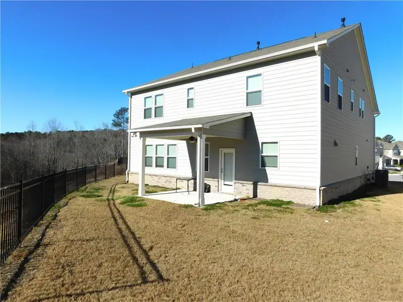 Exterior details and patio area of a home in , Lawrenceville (Image 2). Exterior details and patio area of a home in , Lawrenceville (Image 2).