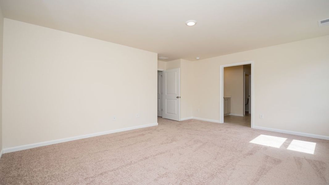 Spacious, unfurnished interior of a new home in The Pines at Blake Farm, Wilmington (Image 31).
