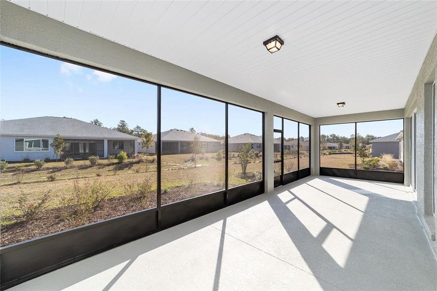 Exterior details and patio area of a home in On Top of the World Communities, Ocala (Image 4).
