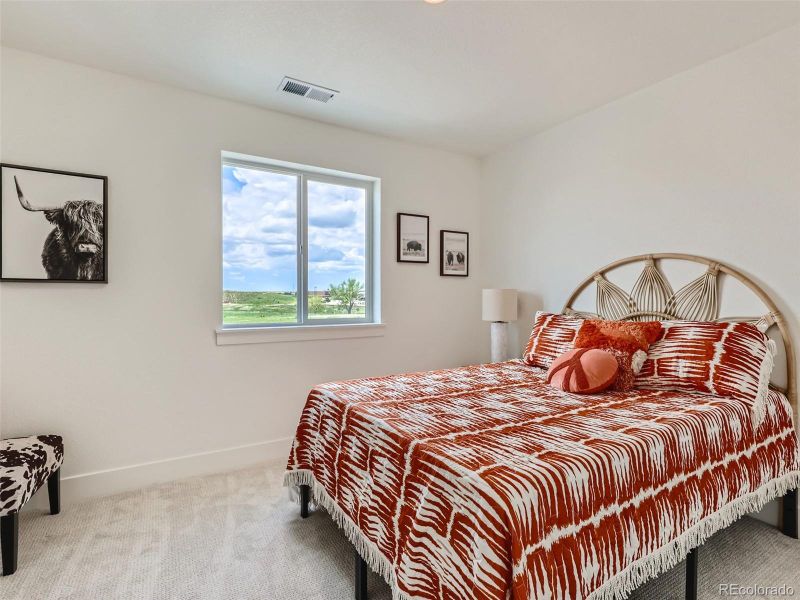 Furnished interior view inside a new home in Elevations at Murphy Creek, Aurora (Image 9).