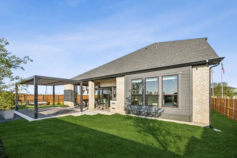 Front exterior of a new home in The Grove Frisco, Frisco, TX, highlighting curb appeal (Image 9).