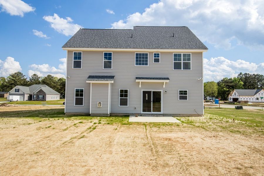 Representative exterior photo of a completed home built from the Ryder by Bill Clark Homes in Arbor Hills South II, Greenville, NC (Image 31). Representative exterior photo of a completed home built from the Ryder by Bill Clark Homes in Arbor Hills South II, Greenville, NC (Image 31).