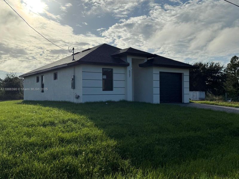 Exterior details and patio area of a home in , Lehigh Acres (Image 2).