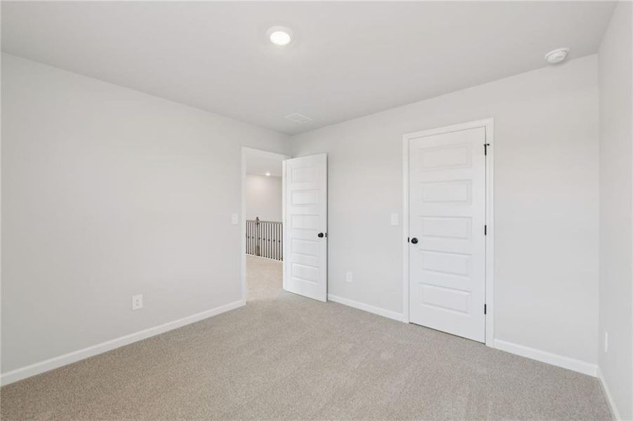 Spacious, unfurnished interior of a new home in Vines at Mill Creek - Estate Series, Braselton (Image 14). Spacious, unfurnished interior of a new home in Vines at Mill Creek - Estate Series, Braselton (Image 14).