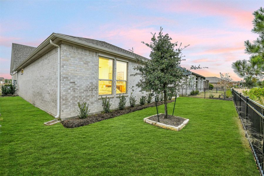 Exterior details and patio area of a home in Del Webb in Chambers Creek, Willis (Image 22). Exterior details and patio area of a home in Del Webb in Chambers Creek, Willis (Image 22).