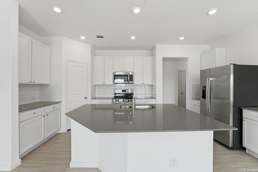 Furnished interior view inside a new home in Guadalupe Heights, Seguin (Image 11).