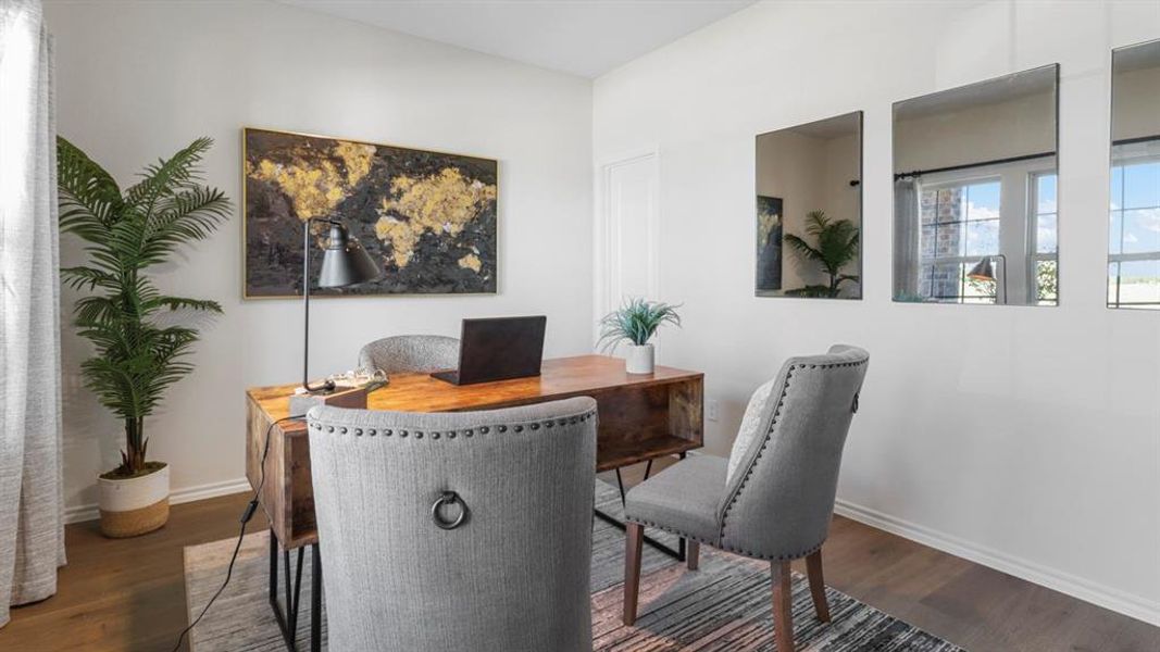 Private room featuring wood-finish flooring, white walls, and white baseboards