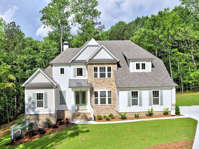 Front exterior of a new home in , Cumming, GA, highlighting curb appeal (Image 17). Front exterior of a new home in , Cumming, GA, highlighting curb appeal (Image 17).