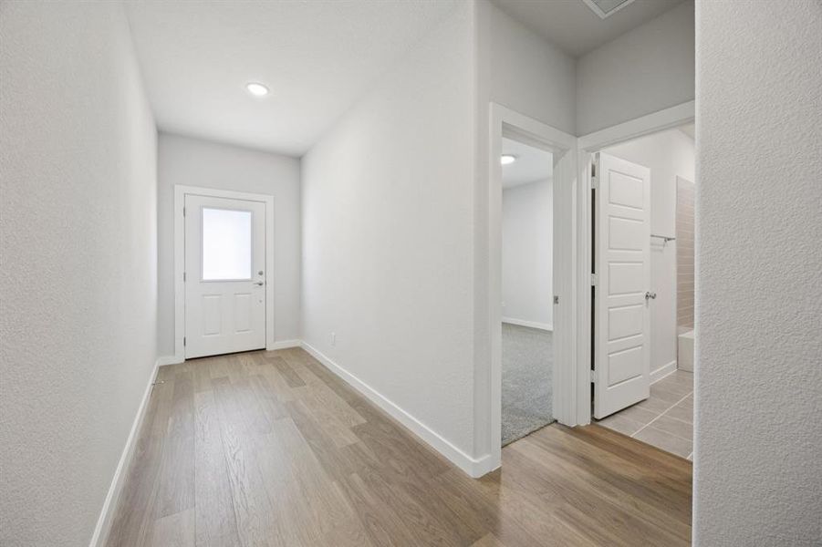 Entryway in the Haylee home plan by Trophy Signature Homes - REPRESENTATIVE PHOTO