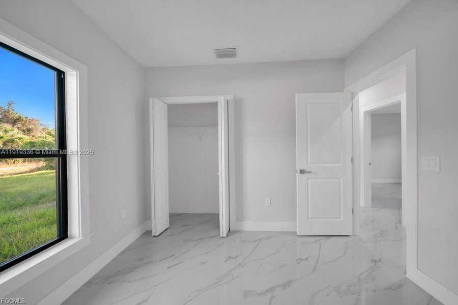 Spacious, unfurnished interior of a new home in , Lehigh Acres (Image 24). Spacious, unfurnished interior of a new home in , Lehigh Acres (Image 24).