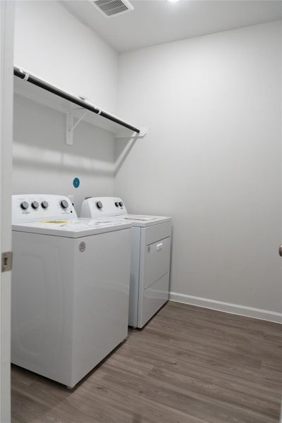 Furnished interior view inside a new home in Lakes at Black Oak, Magnolia (Image 9).