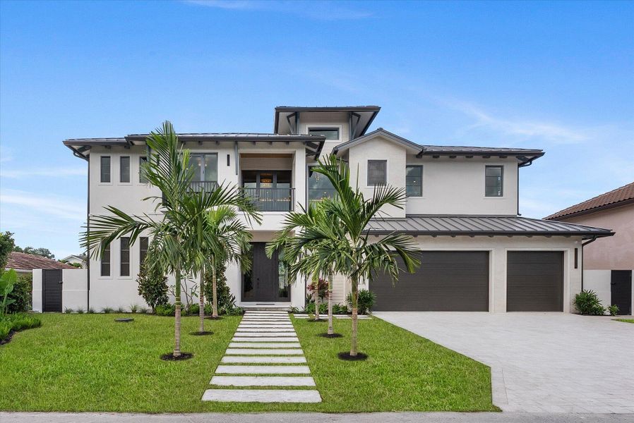 Front exterior of a new home in , Delray Beach, FL, highlighting curb appeal (Image 33). Front exterior of a new home in , Delray Beach, FL, highlighting curb appeal (Image 33).