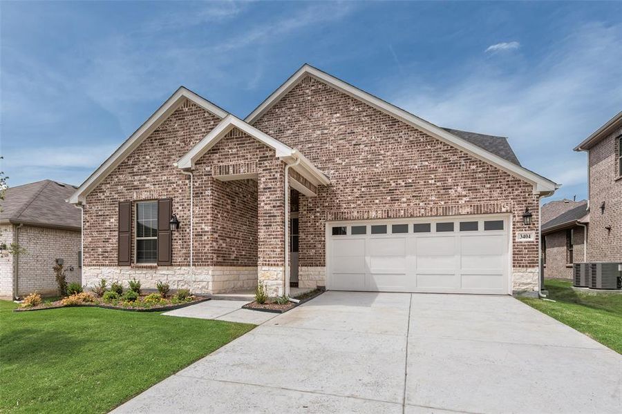 Front exterior of a new home in Villages of Hurricane Creek, Anna, TX, highlighting curb appeal (Image 18). Front exterior of a new home in Villages of Hurricane Creek, Anna, TX, highlighting curb appeal (Image 18).
