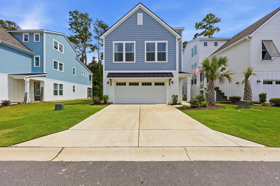Front exterior of a new home in , North Myrtle Beach, SC, highlighting curb appeal (Image 26). Front exterior of a new home in , North Myrtle Beach, SC, highlighting curb appeal (Image 26).