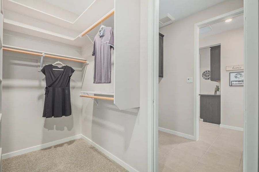 Representative furnished interior of a home built from the 1603 by Elliott Homes in Acacia at Santana, Yuma (Image 16).