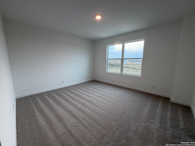 Spacious, unfurnished interior of a new home in The Preserve at the Wilder, Adkins (Image 22).