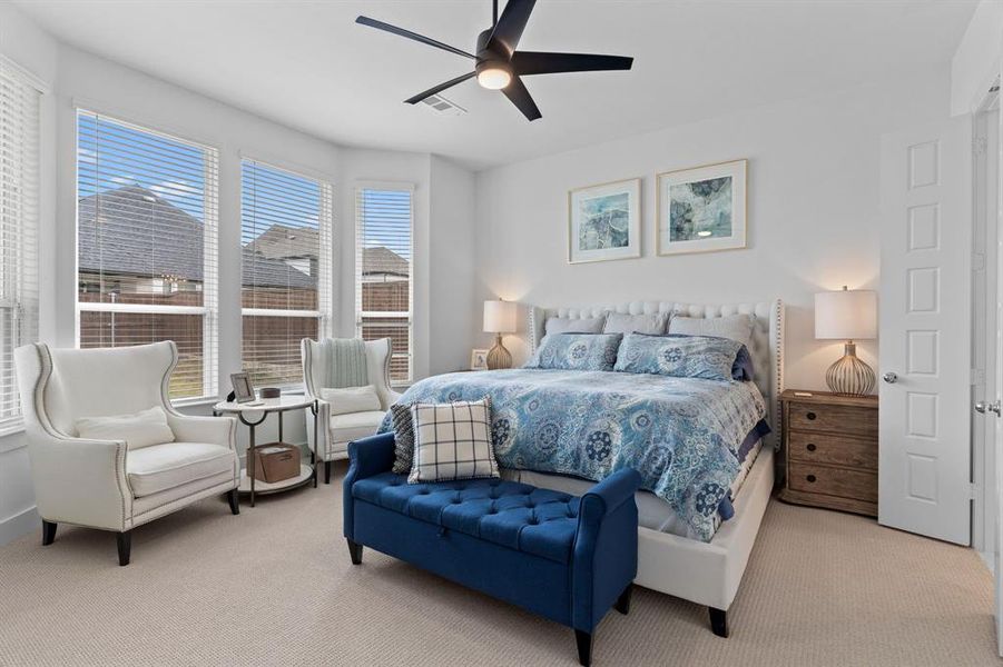 The secluded primary bedroom is generously sized & features a comfortable sitting area by the bay window, creating a classic retreat for relaxing. Plush carpet in all bedrooms too. The secluded primary bedroom is generously sized & features a comfortable sitting area by the bay window, creating a classic retreat for relaxing. Plush carpet in all bedrooms too.