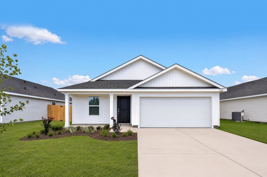 Front exterior of a new home in Horizon's Edge, Milton, FL, highlighting curb appeal (Image 1). Front exterior of a new home in Horizon's Edge, Milton, FL, highlighting curb appeal (Image 1).