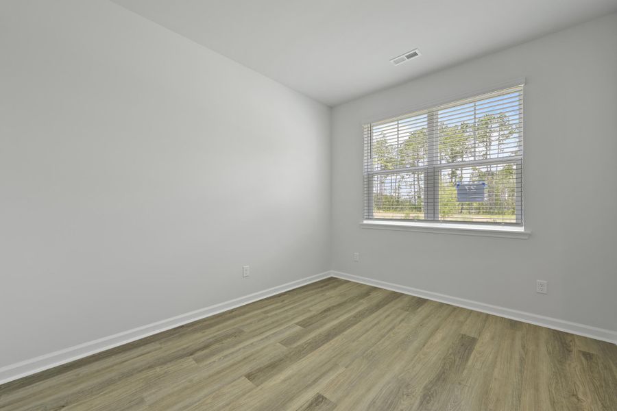 Spacious, unfurnished interior of a new home in Pineview North, Summerville (Image 24).