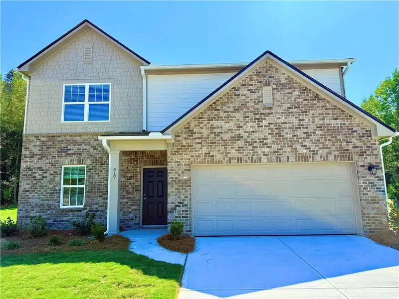 Front exterior of a new home in Silverton, Dacula, GA, highlighting curb appeal (Image 1). Front exterior of a new home in Silverton, Dacula, GA, highlighting curb appeal (Image 1).