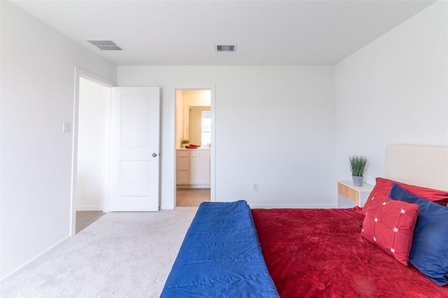 Another view of the primary suite showcasing the large amount of space that it offers. Another view of the primary suite showcasing the large amount of space that it offers.