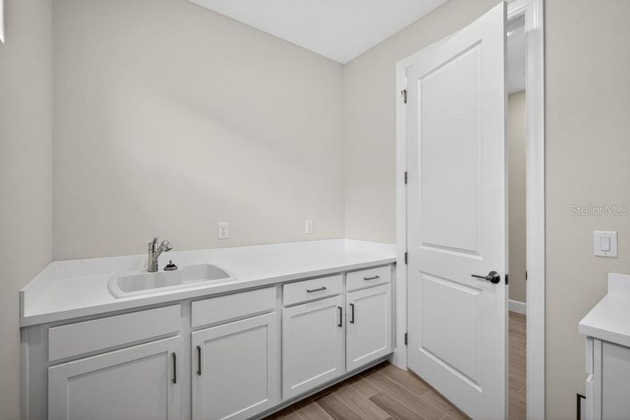 Furnished interior view inside a new home in Esplanade at Wiregrass Ranch, Wesley Chapel (Image 10).
