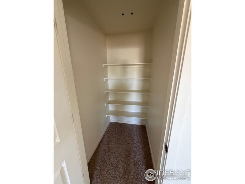 Linen closet by laundry room Linen closet by laundry room