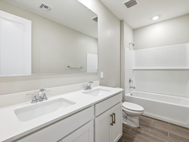 Furnished interior view inside a new home in White Tank Foothills Signature Series, Waddell (Image 6).