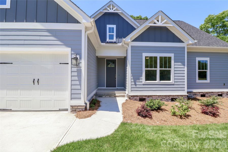 Exterior details and patio area of a home in , Statesville (Image 24).