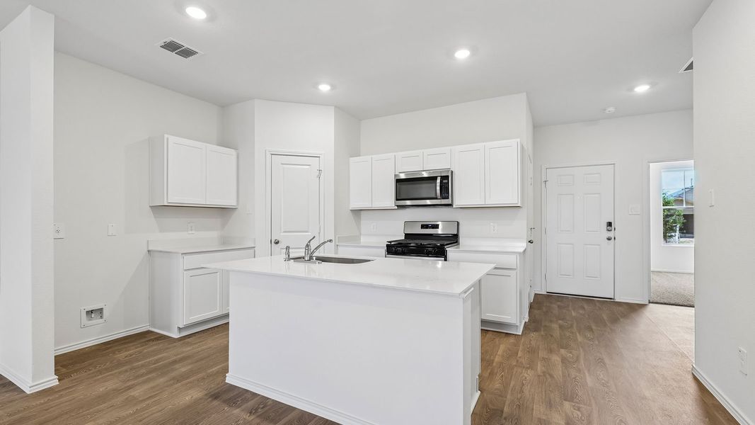 Furnished interior view inside a new home in Wayside, Uhland (Image 6).