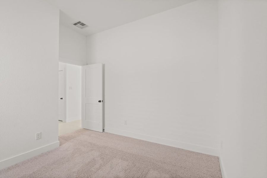Representative unfurnished interior of a home built from the Berkley by Chesmar Homes in The Woodlands Hills, Willis (Image 16). Representative unfurnished interior of a home built from the Berkley by Chesmar Homes in The Woodlands Hills, Willis (Image 16).