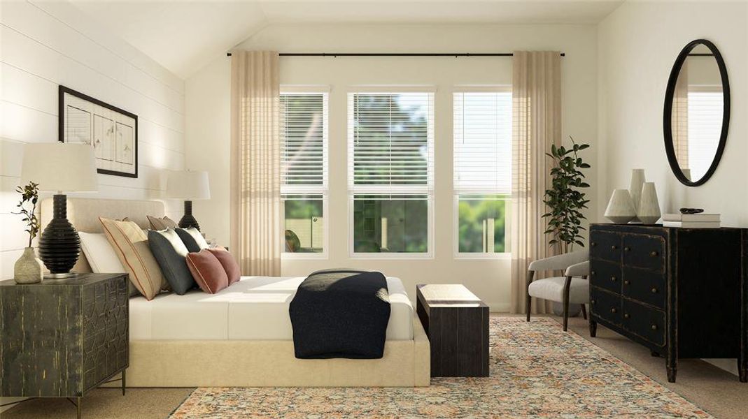 Bedroom with carpet flooring and vaulted ceiling