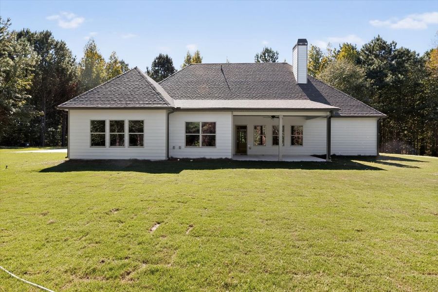 Exterior details and patio area of a home in White Oaks, The Rock (Image 4).